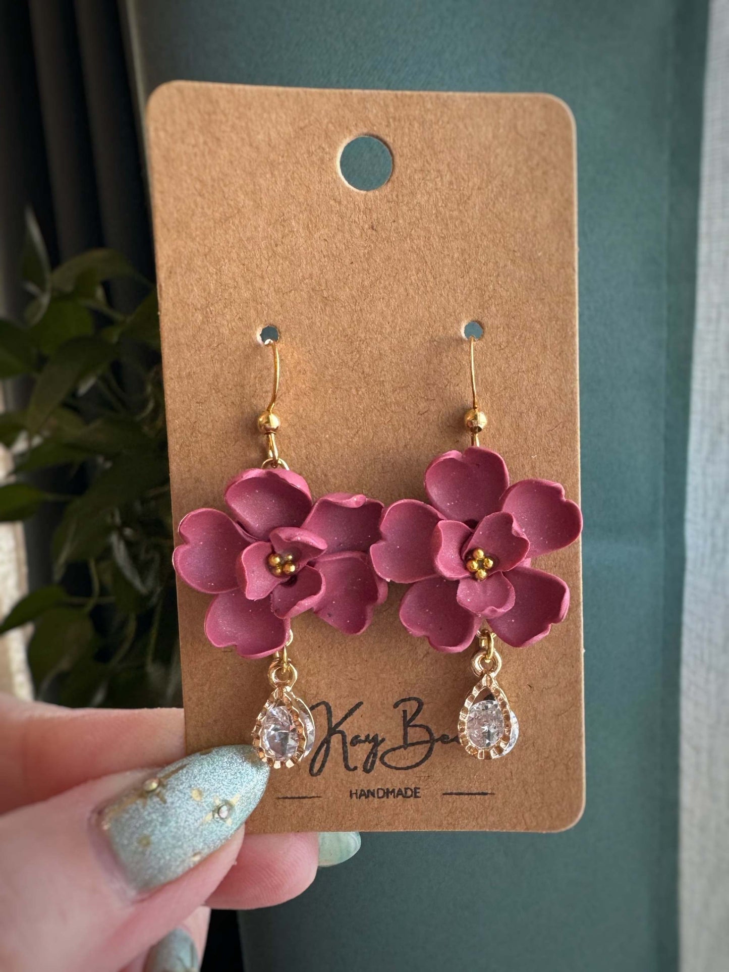 Floral sculpted earrings on gold and silver stainless steel ear wires