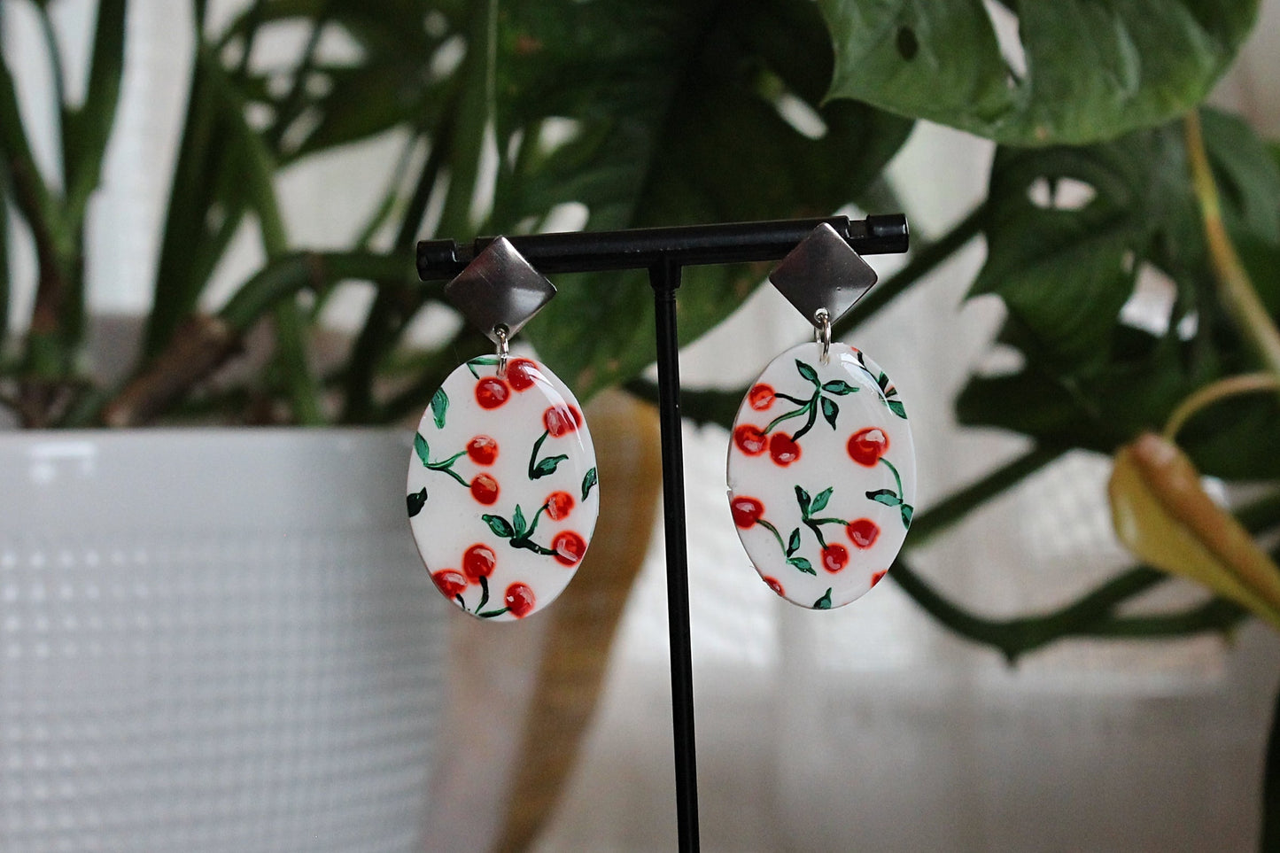 Silver stainless steel Cherry Ovals earrings with hand painted red cherries and green leaves, 1.75 inch drop