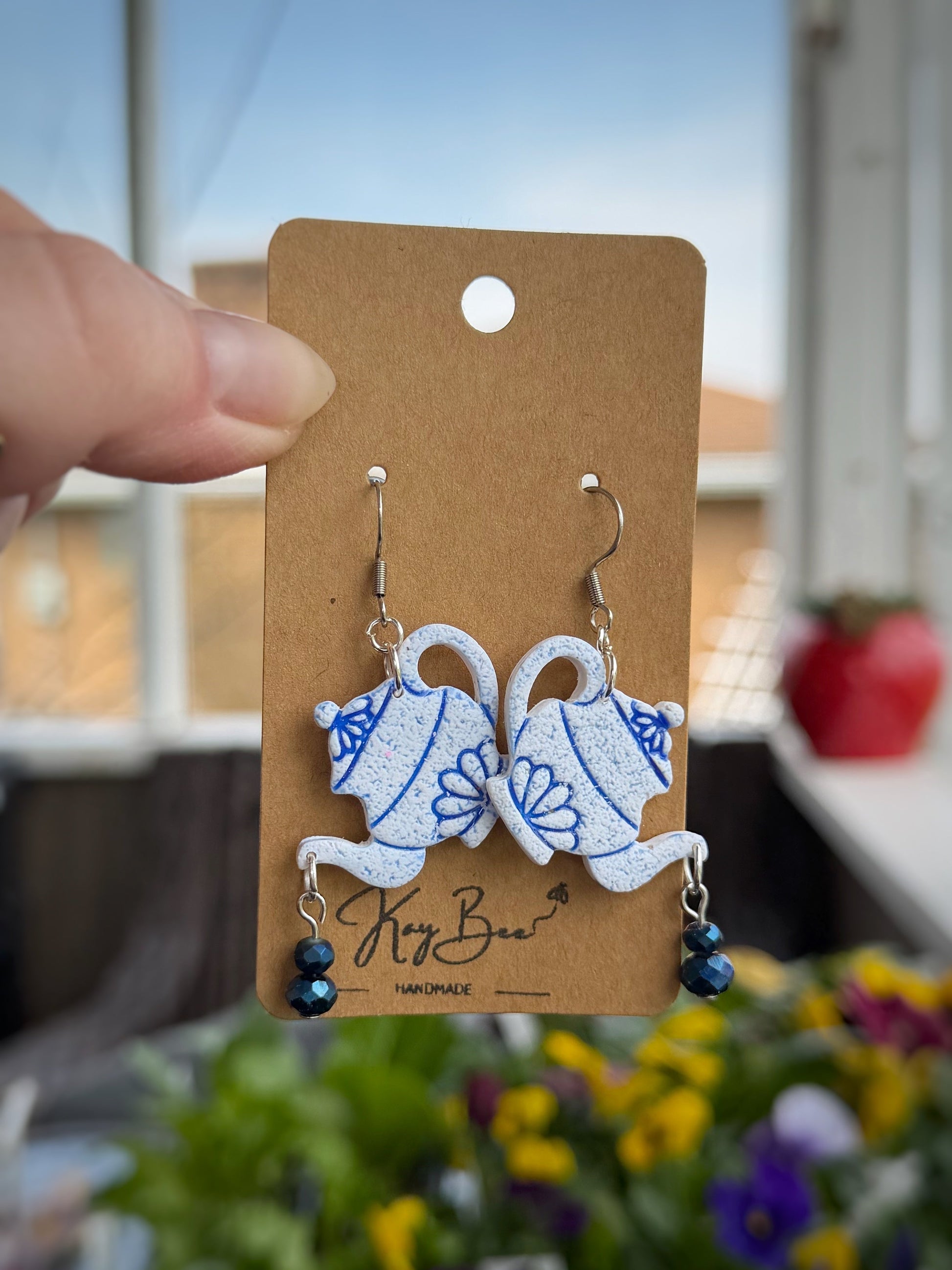 Blue and white handmade blue tea pot earrings with 2.25 inch drop, gold or silver options, lightweight and stainless steel posts